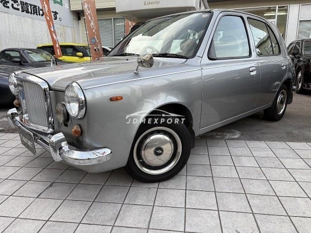 1999 Nissan March 2WD GF-HK11